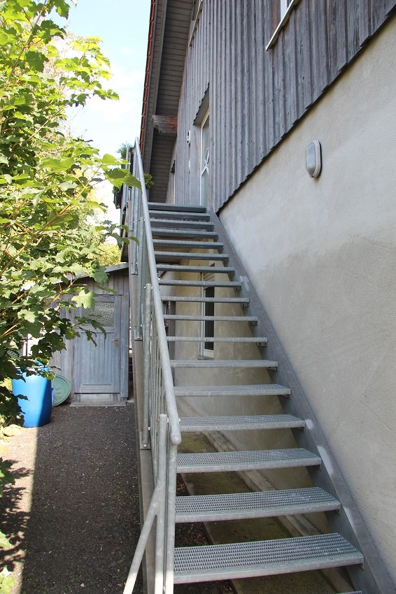 die Treppe zur Wohnung
